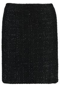 Svart kjol gjord av texturerad tyg, med ett vävt mönster och en liten glans. Rakt snitt med midjehög midjeband.