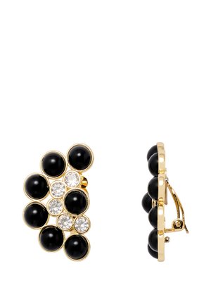 Sorte og klare stensear ringer med en guldfarvet indfatning, der har et klusterdesign og runde former i forskellige størrelser.