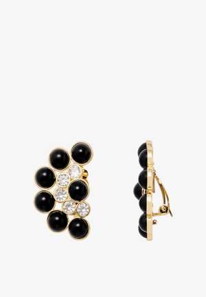 Boucles d'oreilles en pierre noire et transparente avec un réglage doré, présentant un design en grappes et des formes rondes de tailles variées.