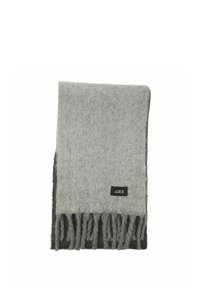 Écharpe grise en matériau doux, avec un bord frangé. Le tissu passe d'un gris clair en haut à un gris plus foncé en bas. Détail d'étiquette noire.