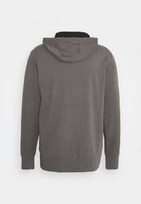 Sweat-shirt gris à capuche à manches longues vu de dos, avec une coupe ample et des poignets et un ourlet côtelés.