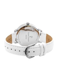 Reloj con correa de cuero blanco y caja de acero inoxidable, de forma redonda, parte trasera pulida y hebilla plateada. Presenta un grabado de la marca en la parte trasera.