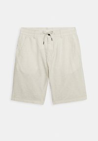 Beige linnebyxor med elastiskt midjeband, dragsko och två sidfickor. Tyget har en mjuk, texturerad yta.