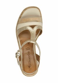 Sandalo da donna con cinturini in pelle beige e oro, design open toe, suola simile al sughero, cinturino alla caviglia regolabile e soletta imbottita.