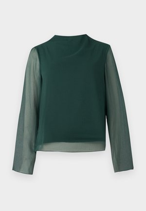 Long-sleeve top featuring a solid dark green body and sheer sleeves. Round neckline, lightweight fabric, and a relaxed fit.