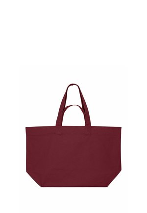 Grand sac cabas bordeaux avec deux poignées courtes et deux longues, base rectangulaire, et design simple sans logos ni motifs visibles.