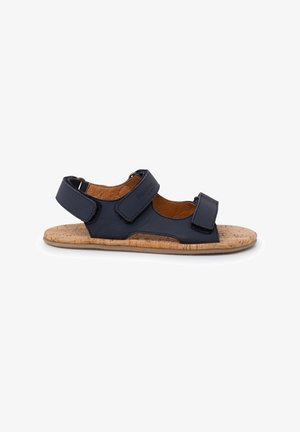 Navy blue sandal with two adjustable Velcro straps, cork footbed, and rubber outsole. Open-toe design with textured upper.