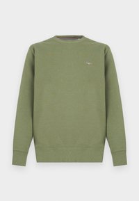 Sweatshirt vert en mélange de coton avec col rond, poignets et ourlet côtelés. Présente un petit logo sur la poitrine. Texture lisse.