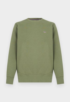 Žalias medvilnės mišinio džemperis su apvalia apykakle, ribinėmis rankovėmis ir apačia. Ant krūtinės yra mažas logotipas. Lygus tekstūra.