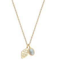 Gold chain necklace featuring a leaf-shaped pendant and a textured oval charm with a reflective surface. Simple and elegant design.