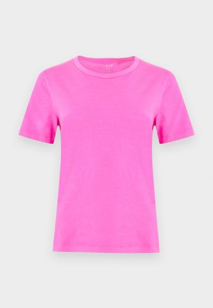 T-shirt rose vif à manches courtes et col rond, présenté de face sur un fond gris clair uni.