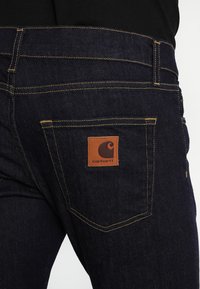 Carhartt Wip Rebel Pant Spicer Jeans Slim Fit Blue One Wash Rinsed Denim Zalando De