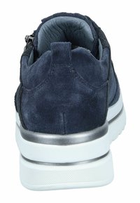 Navy suede sneaker with a metallic silver heel accent and white rubber outsole. Features a padded collar and textured detailing on the surface.