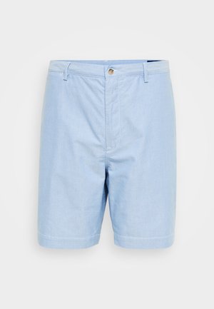 Shorts en coton bleu clair avec une coupe droite, fermeture à bouton et deux poches latérales. Texture lisse et ourlets repliés.