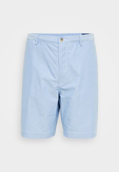 Shorts en coton bleu clair avec une coupe droite, fermeture à bouton et deux poches latérales. Texture lisse et ourlets repliés.