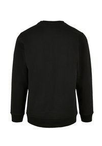 Sudadera negra con mangas largas, cuello redondo y puños y dobladillo acanalados. La tela parece suave, sin patrones o acentos visibles.