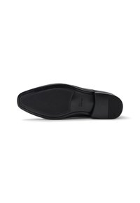 Suola di scarpa elegante in pelle nera, con una presa in gomma texturizzata, caratterizzata da una forma slanciata e dettagli in rilievo sul tallone.