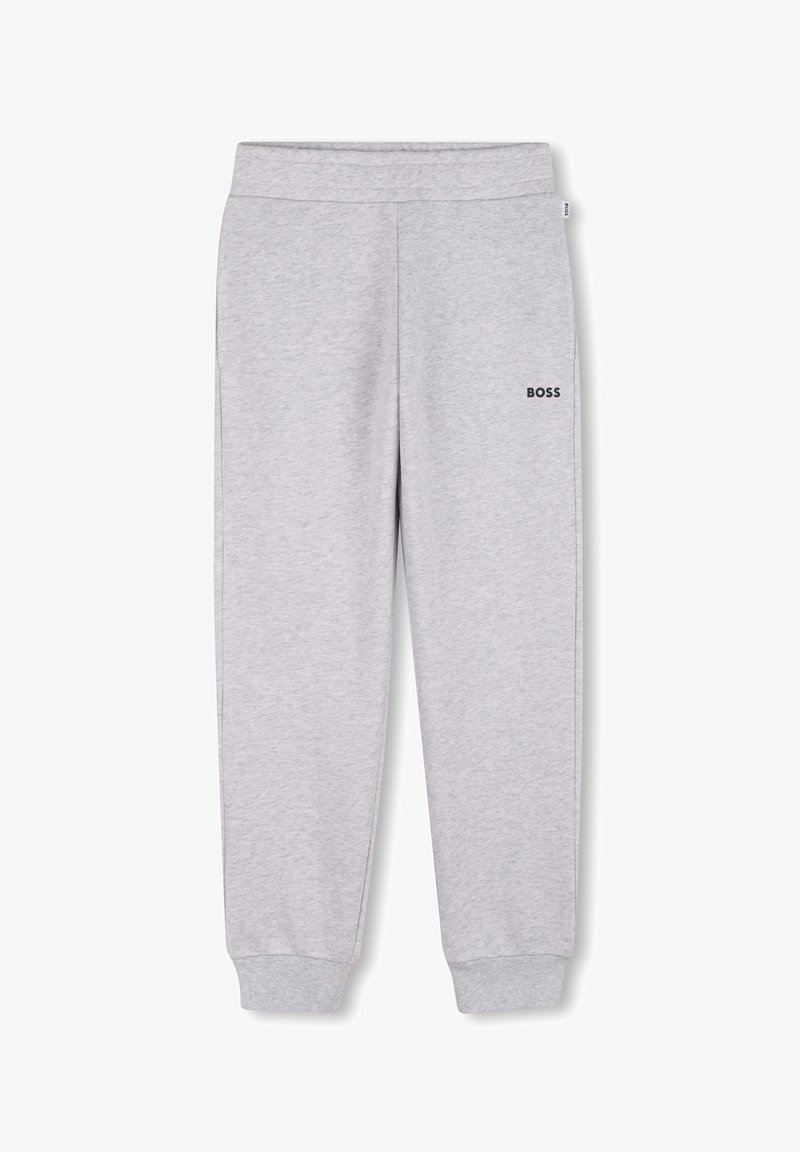Pantalons de survêtement gris en tissu doux, avec un taille à cordon, des poignets côtelés et un petit logo noir "BOSS" sur le côté gauche.
