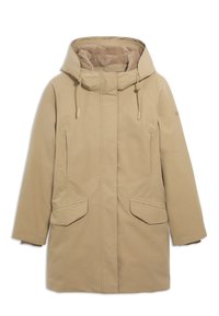 Parka impermeabile beige con cappuccio foderato in pelliccia, chiusura frontale con zip e bottoni a pressione, due grandi tasche a toppa e silhouette dritta.