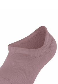 Rosa Knöchelsocke aus geripptem Stoff mit glatter Textur, niedriger Schnitt und kleinen Gummigrips an der Sohle für zusätzlichen Halt.