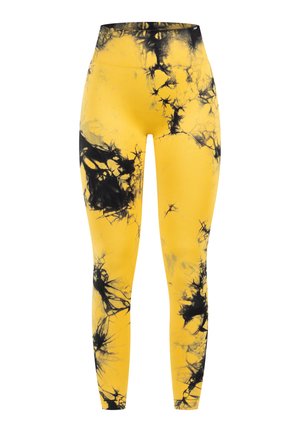 Gule leggings med et sort tie-dye mønster, der har en høj talje og en glat, strækbar tekstur, der er velegnet til aktivt brug.