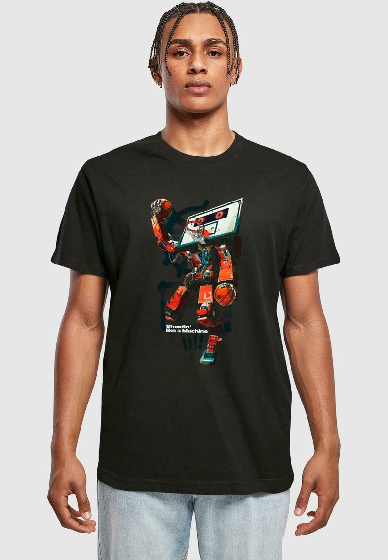 Black t-shirt featuring a colorful, graphic design of a robotic figure playing basketball, with text "Shootin' like a Machine."