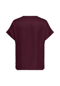 Short-sleeve loose-fit blouse in deep burgundy with simple round neckline and a textured fabric finish.