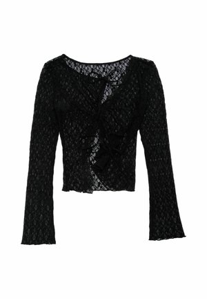 Black lace long-sleeve top with a v-neck, front ties, and flared sleeves. Features a scalloped hem and an intricate floral pattern.