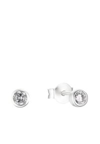 Orecchini a perno in argento con gemme trasparenti rotonde in montatura a bezels. Design semplice con finitura lucida e chiusura sicura.