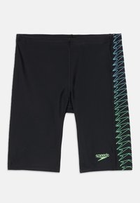 Melni peldbikši ar ciešu piegriezumu un sānu paneli, kurā ir zaļš un zils zigzaga raksts. Iekļauta Speedo logo zaļā krāsā.