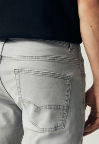 Next AUTHENTIC - Kitsenevad teksad - pale grey