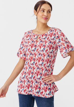 Bluse mit rot-weiß-blauem Muster, kurzen Ärmeln, einem Schlüsselloch-Ausschnitt und geraffter Textur mit einem ausgestellten Saum.