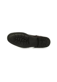 Suola di scarpa in gomma nera con un motivo testurizzato caratterizzato da scanalature e creste per migliorare la trazione. Bordo liscio e design curvo.