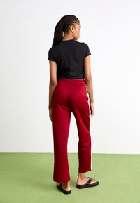 Puma GRAPHICS MUSIC BABY  - Marškinėliai su spaudiniu - black