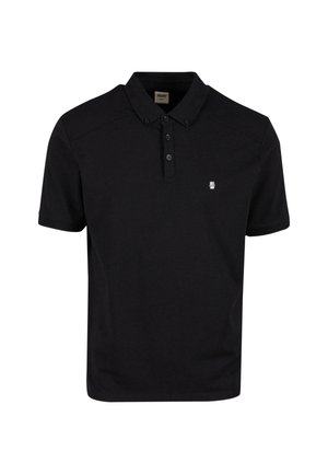 Camisa polo negra de manga corta hecha de algodón, con cuello, tapeta de tres botones y un pequeño logotipo bordado en el pecho.