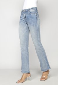 Koroshi Blugi bootcut - light blue