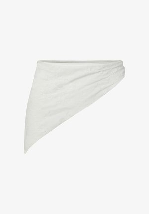 Jupe portefeuille asymétrique en dentelle blanche avec ourlet incliné et motif floral subtil.