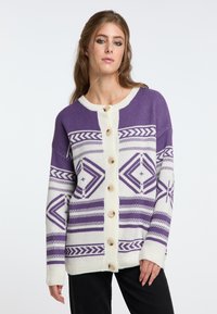 Lila och gräddfärgad stickad cardigan med geometriska mönster, stora knappar och en avslappnad passform med ribbade ärmslut och nederkant.