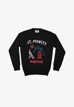 Maglione nero con ricami giocosi di montagne, un sole, sci e un treno, con le scritte "ST. MORITZ" e "HABITUÉ" in colori a contrasto.