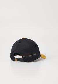 Under Armour PROJECT ROCK TRUCKER UNISEX - Sapka - yellow ochre/black