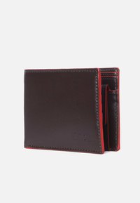 Brown leather wallet with red stitching, bi-fold design, and multiple card slots. Features embossed logo on the front.