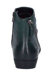 Green leather ankle boot with a smooth texture, side zipper detailing, and a rounded toe. Features a low, sturdy heel.