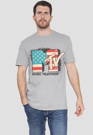 Gray cotton T-shirt featuring a distressed MTV logo in red, blue, and white, resembling the American flag. Short sleeves, crew neck design.