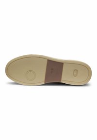 Sole of a shoe in light beige rubber with a textured surface. Features a brown leather accent with "BOSS" embossed. Smooth edges.