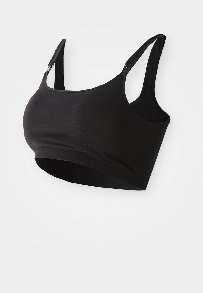 Svart sømløs bralette med justerbare stropper, myk stoff og bredt bånd. Ingen bøyle, designet for komfort og støtte.