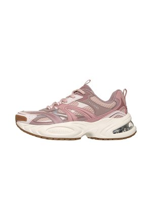 Zapatilla deportiva Skechers rosa y beige con paneles de malla, suela blanca gruesa, dibujo marrón y cojín de aire visible en la zona del talón.