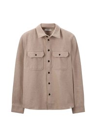 Chemise en flanelle beige avec un col pointu, deux poches poitrine et des boutons noirs. Elle a des manches longues et un ourlet arrondi.