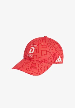 Red baseball cap with abstract pattern, "TEAM" and "D" logo, Olympic rings on front, and white Adidas logo on side.