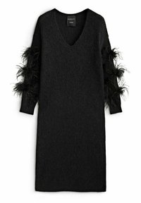 Black knitted dress with a deep v-neck, long sleeves adorned with black feather accents, and a relaxed fit. Smooth texture.