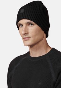 Koroshi Adīta cepure - black
